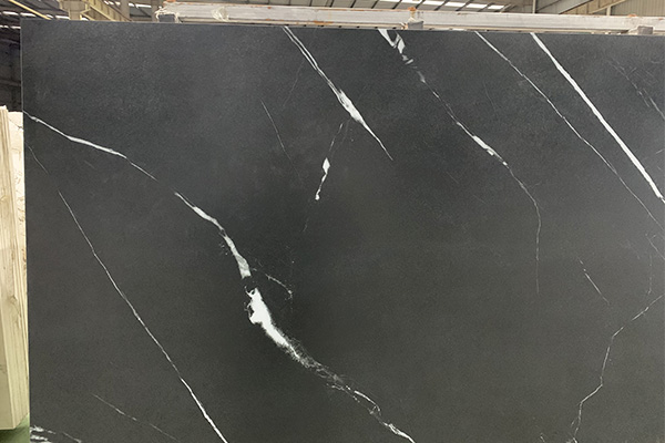 black stone slab with Nero Marquina marble design 